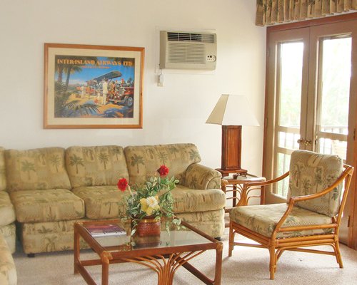 A well furnished living room with pullout sofa and an outside view.