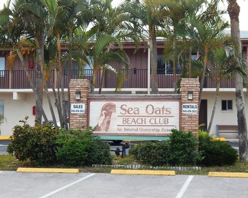 Signboard of Sea Oats Beach Club Resort.
