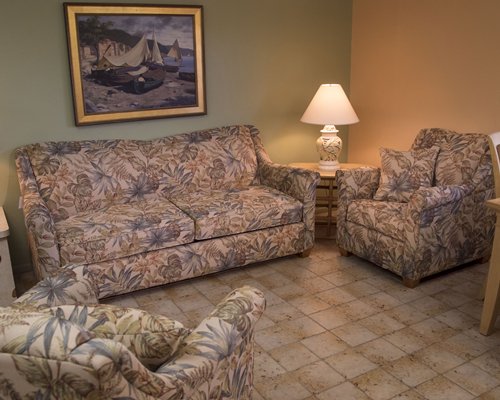 A well furnished living room with pullout sofa.