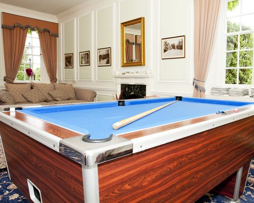 An indoor play area with a pool table.