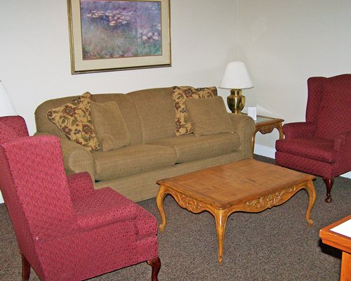 A well furnished living room with a double pull out sofa.