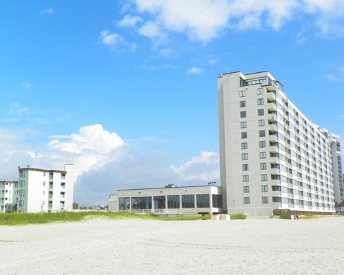 Exterior view of multi story units from the beach.