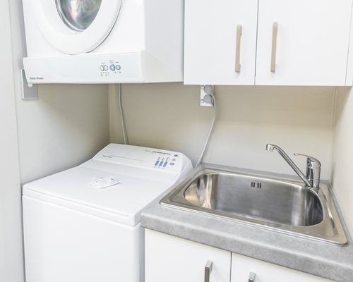 Laundry area with a sink.