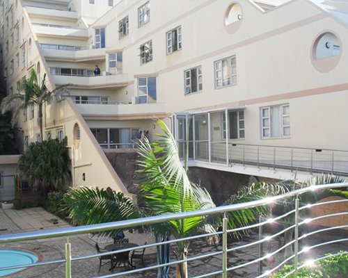 An exterior view of multi story balconies.