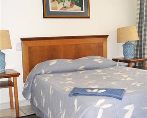 A well furnished double bed.