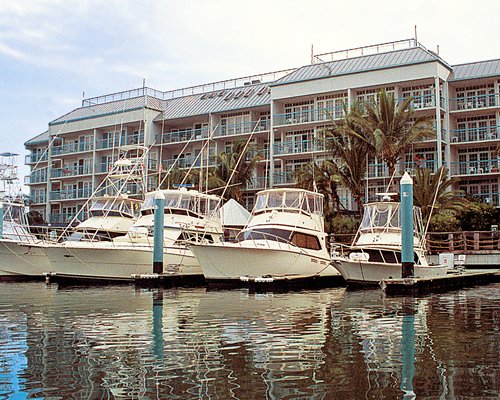 A marina alongside multi story resort.
