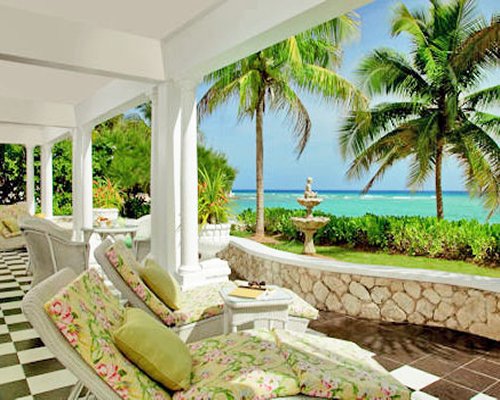 A balcony scenic landscape alongside the ocean.