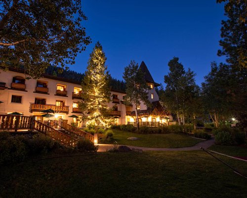 Scenic view of Olympic Village Inn resort with the water stream flowing.