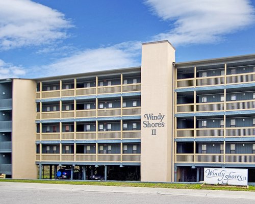 Exterior view of Windy Shores with multiple unit balconies.