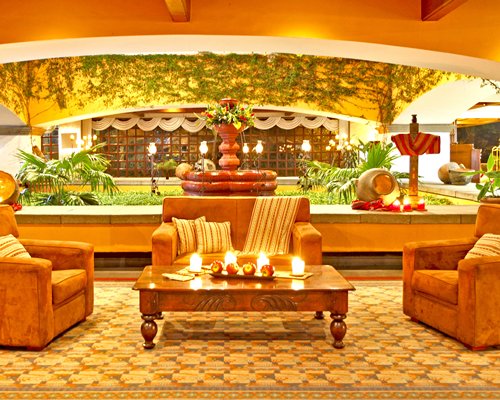 Hotel Soleil La Antigua reception area with fountain.