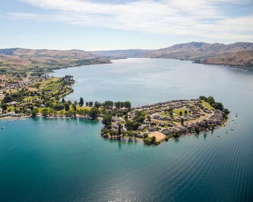 AN AERIAL VIEW OF WAPATO POINT RESORT ALONGSIDE THE LAKE.