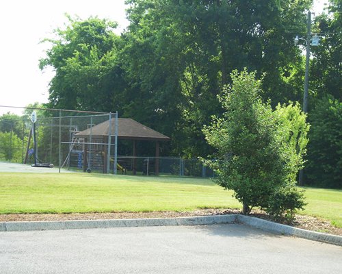 View of playground and tennis court.