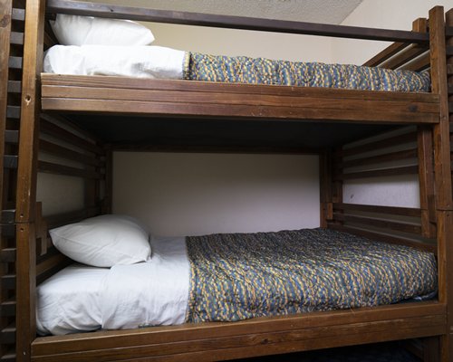 Furnished bedroom with bunk beds.