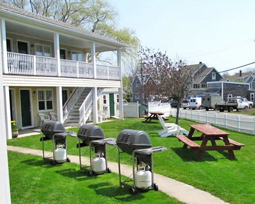 An outdoor picnic area with barbecue grills.