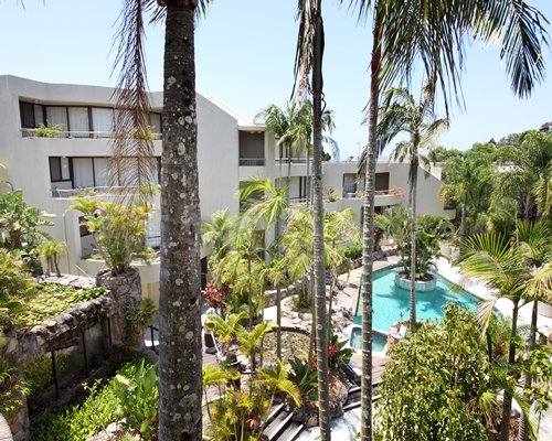 Exterior view of Club Noosa with an outdoor swimming pool.