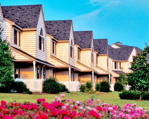 EXTERIOR VIEW OF MULTIPLE UNITS AT THE HISTORIC POWHATAN RESORT.