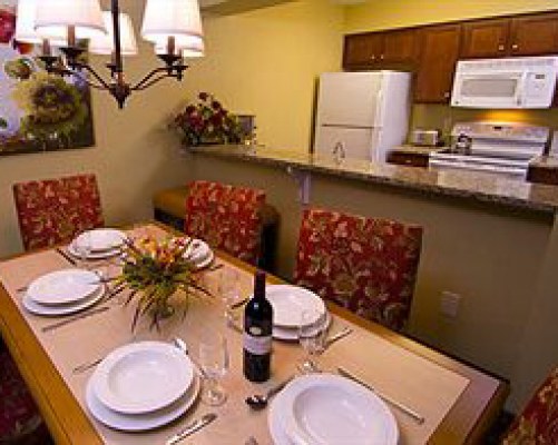 AN OPEN PLAN KITCHEN AND DINING AREA.