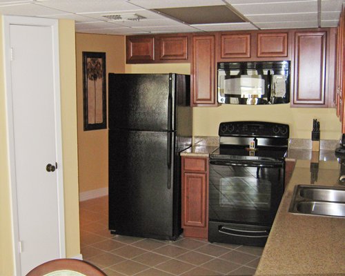 A well equipped kitchen with microwave.