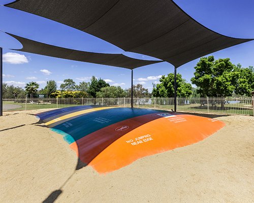 Outdoor recreation area with sunshades.