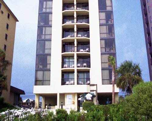 Scenic exterior view of a unit with balconies at Schooner II Beach and Racquet Club.