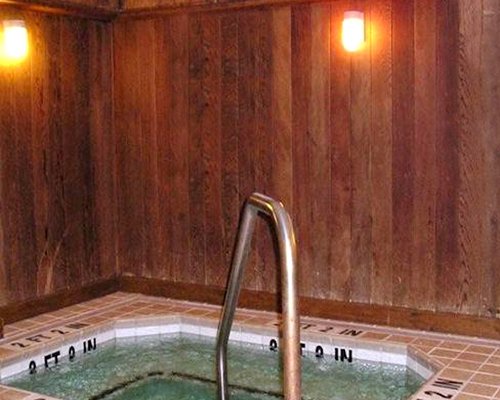 A well furnished indoor hot tub.