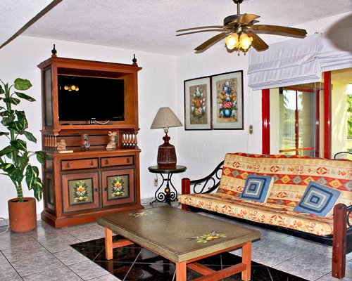 A well furnished living room with television.