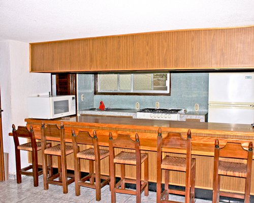 An open plan kitchen and dining area.