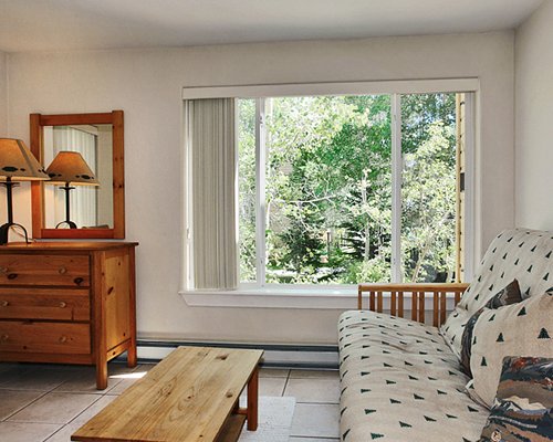 A well furnished living room with outside view.