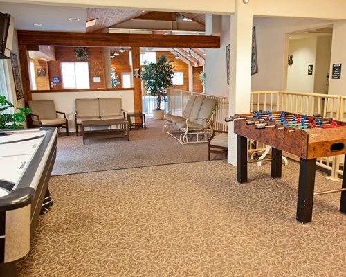 An indoor recreational area with a foosball table.