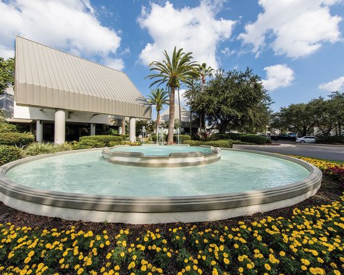 A large fountain and pathway to Sabal Palms.