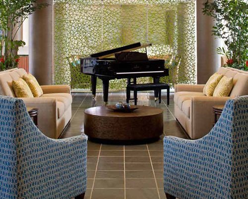 Indoor lounge area with a piano.