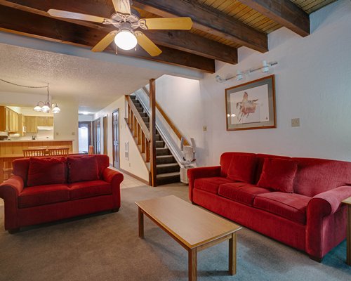 A well furnished dining room with a breakfast bar.