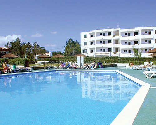 Multi story units overlooking the outdoor swimming pool.