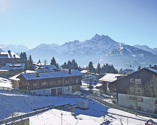 A view of the Residence Panorama Villars covered in snow.