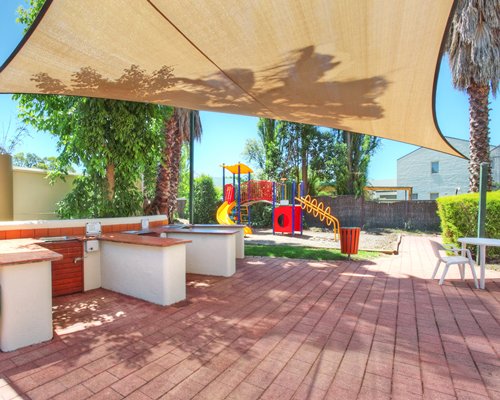 An outdoor playscape area for kids.
