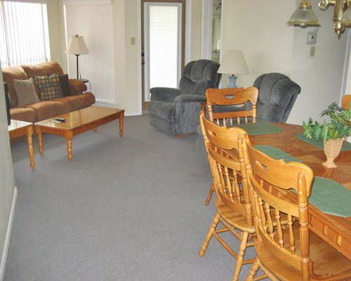 A well furnished living room and dining area.
