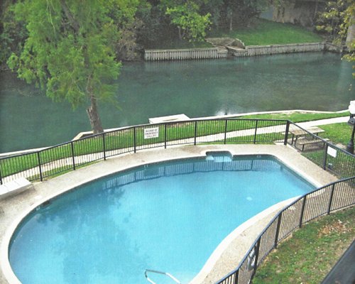 Outdoor swimming pool alongside Inverness at New Braunfels.