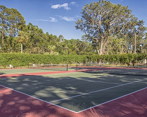 Outdoor recreation area with tennis courts.