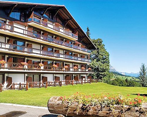 Scenic exterior view of resort unit with multiple balconies.