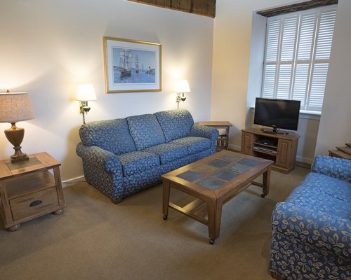 A well furnished living room with television.