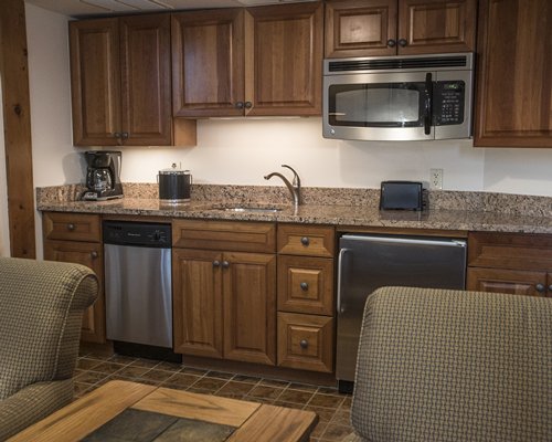 Living room with a kitchen.