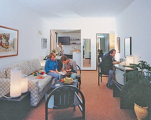 A family in the well furnished living room.