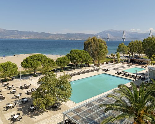 Outdoor swimming pools steps away from the beach.