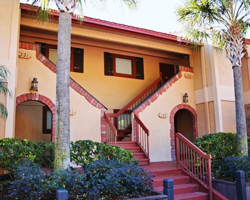 Scenic exterior view of a unit with stairway Bryan's Spanish Cove.