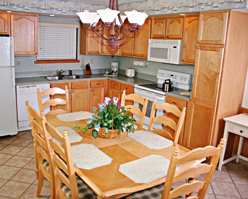 An open plan kitchen with a dining area.