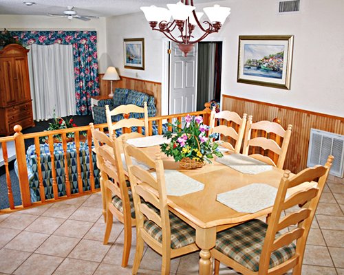 A well furnished living room and dining area.