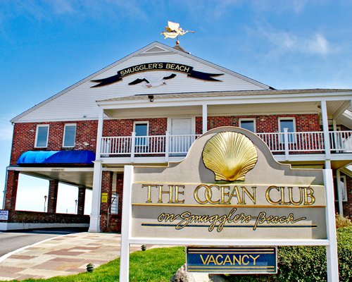 Signboard of The Ocean Club on Smuggler's Beach resort.