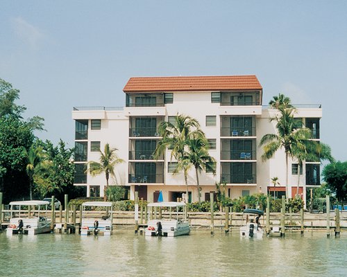 Exterior view of the Bonita Resort And Club alongside a marina.