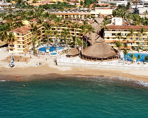 An aerial view of the Hotel Las Palmas Beach Resort alongside the waterfront.