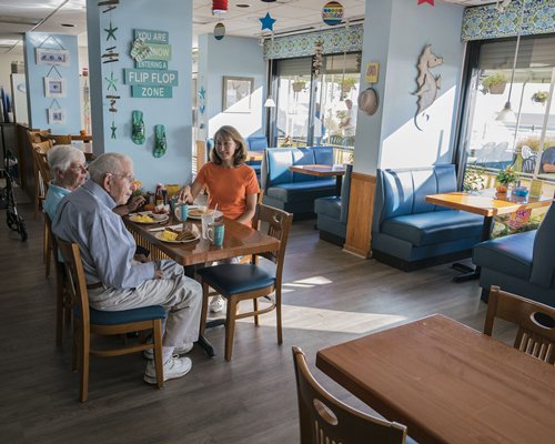 A family in an indoor restaurant.